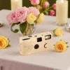Stylish paper-wrapped disposable camera for party favors